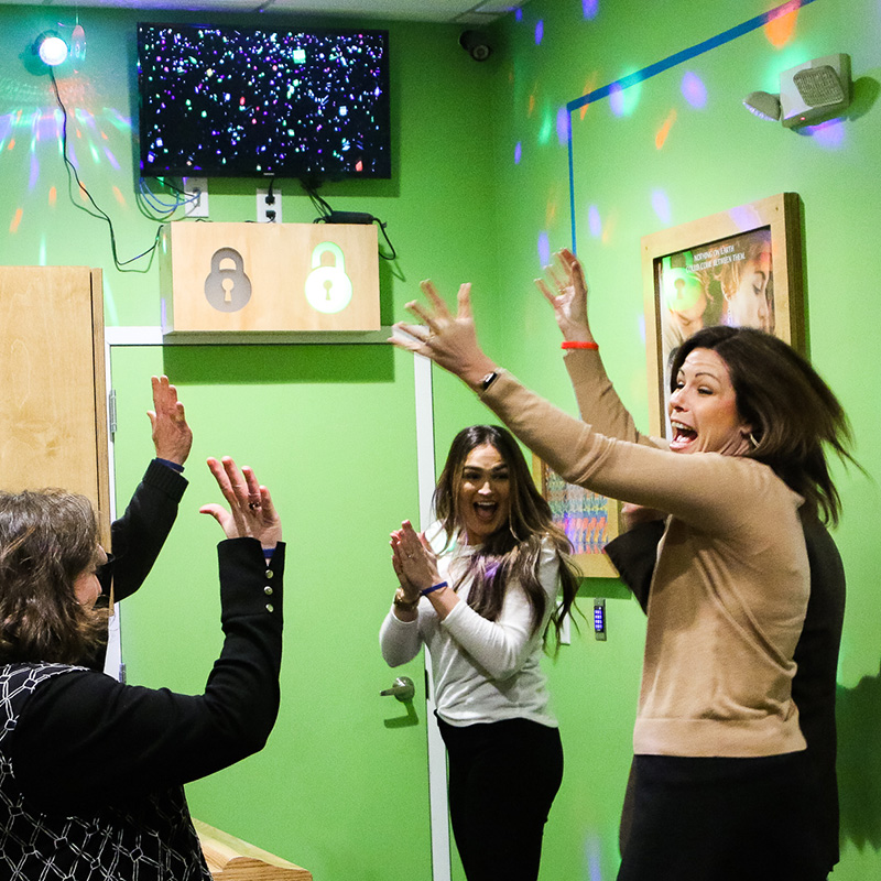 Groups-parties Breakout KC Team Lab Team Building Escape Room Experience Excited Group Winning